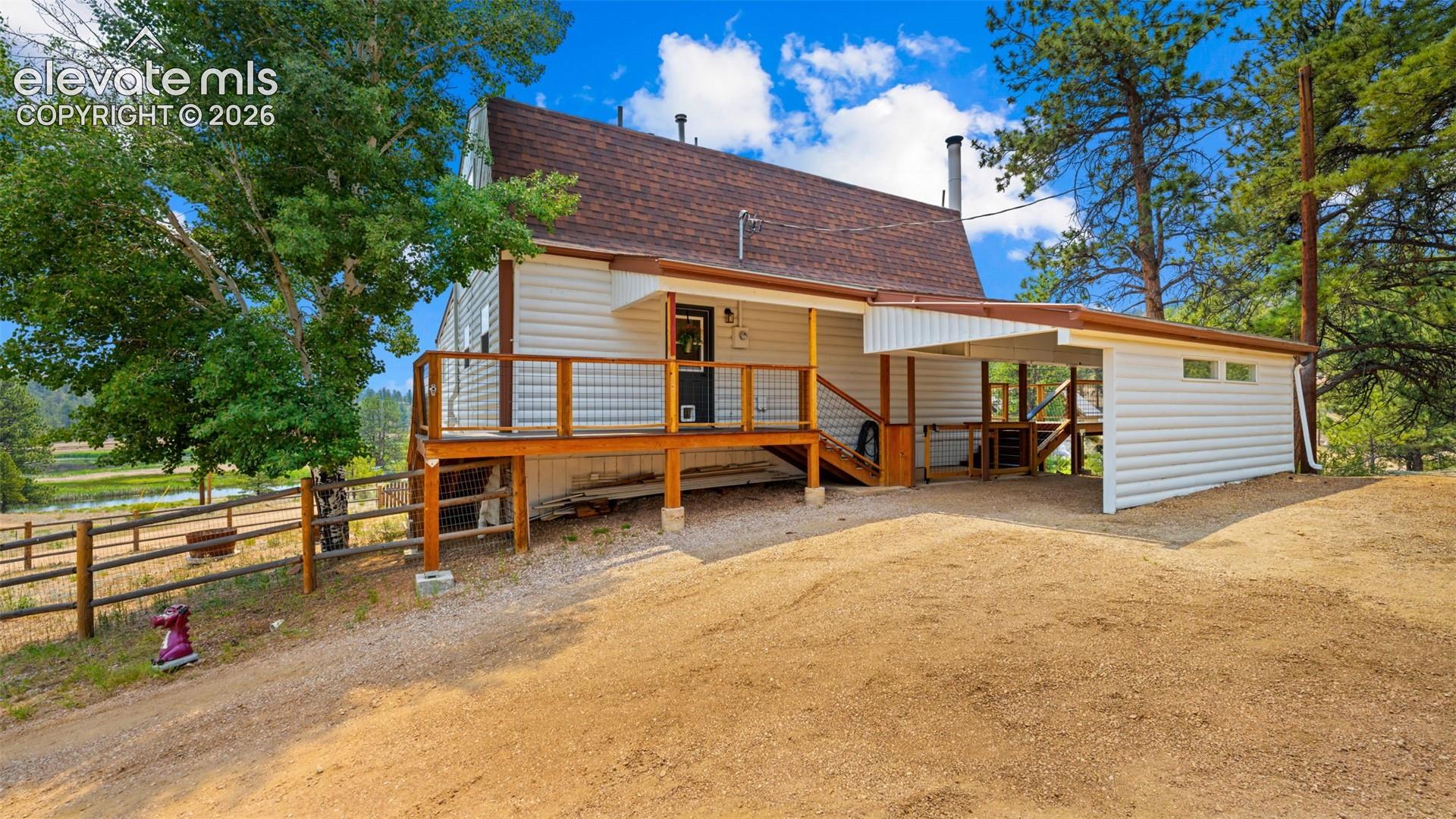 Fabulous wrap deck! Car port + attached garage!