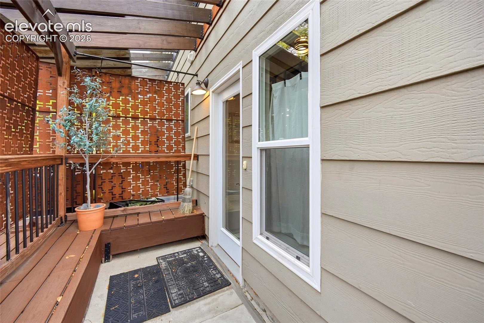 Access door to Guest Apartment on rear of home.