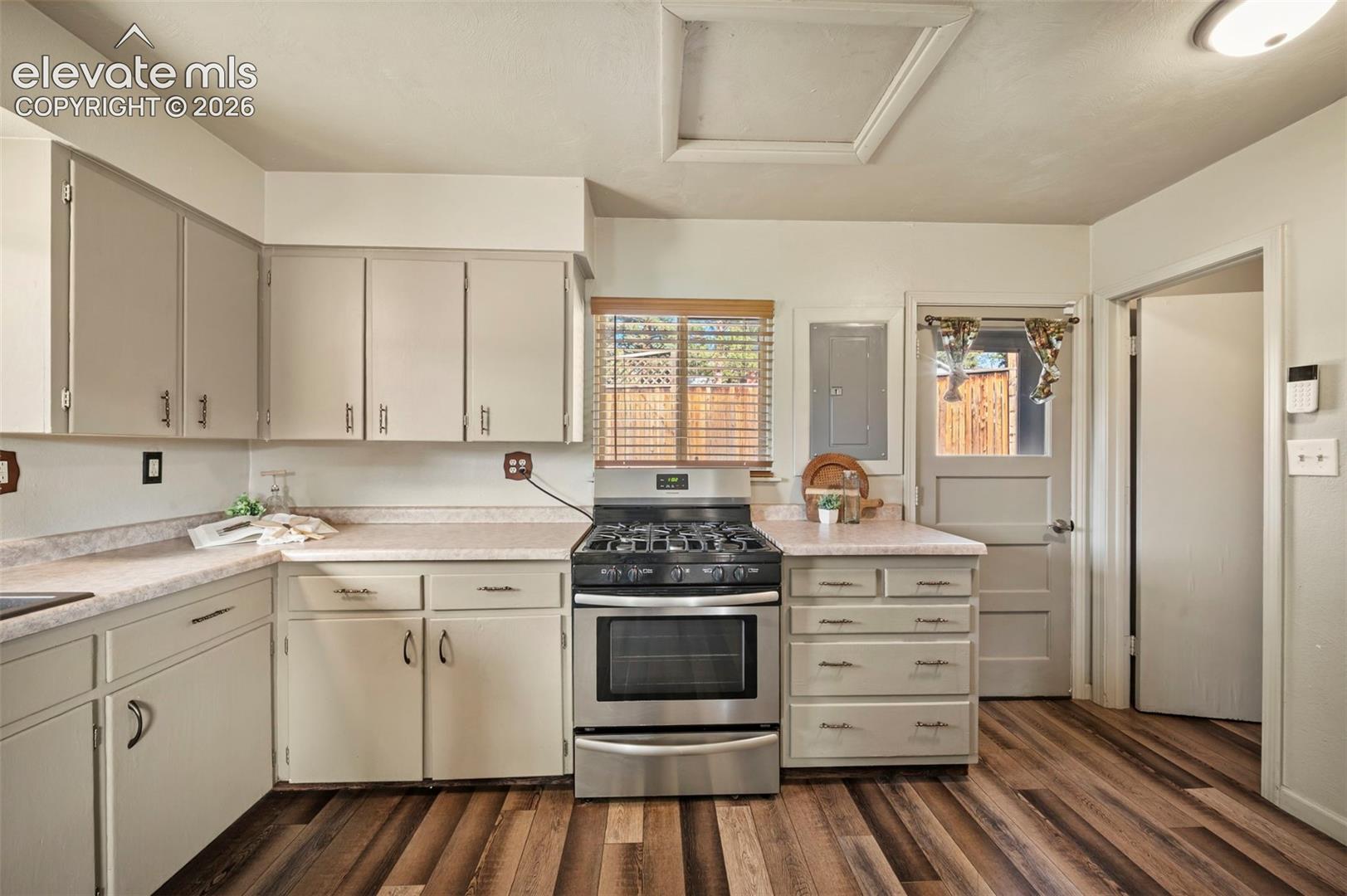 Kitchen with walk out to the backyard area