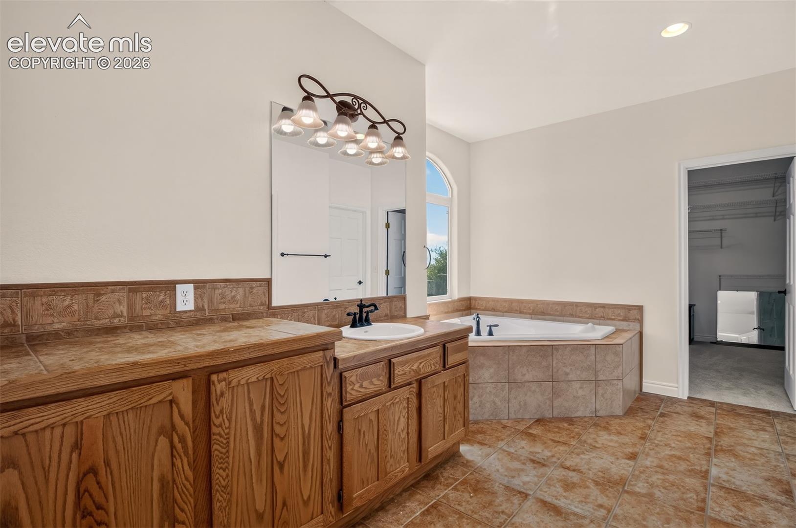 Large Walk-In Closet, Tile Floor And Counters