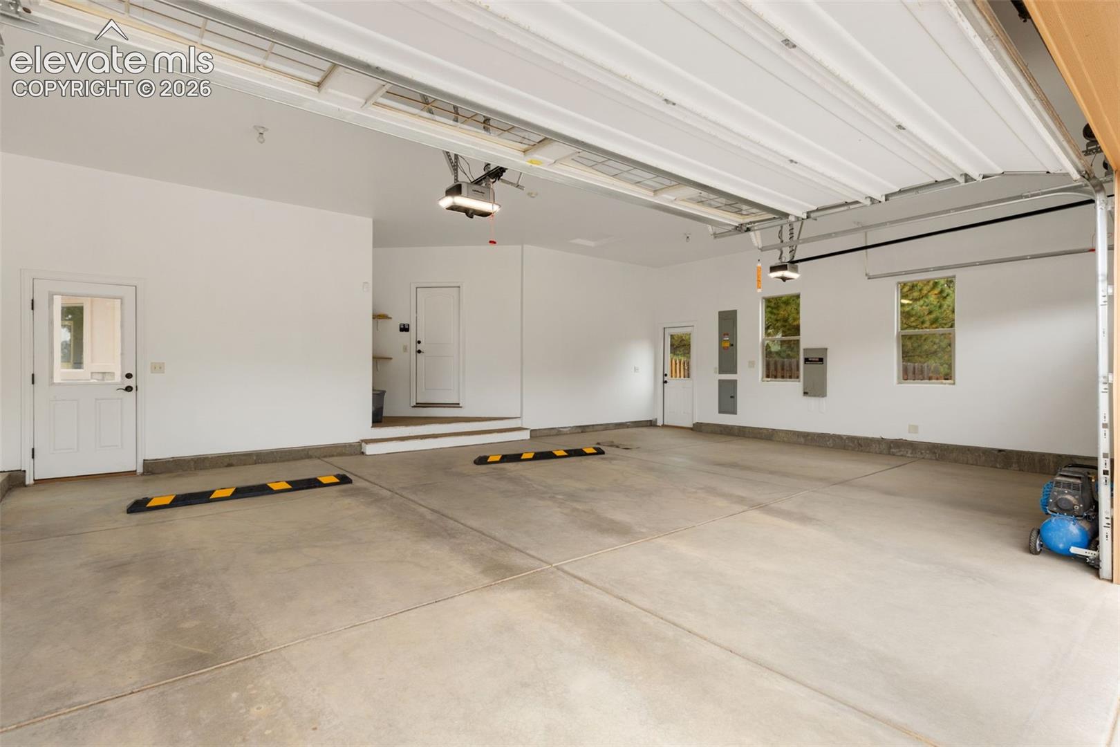 Oversized attached 3 car garage