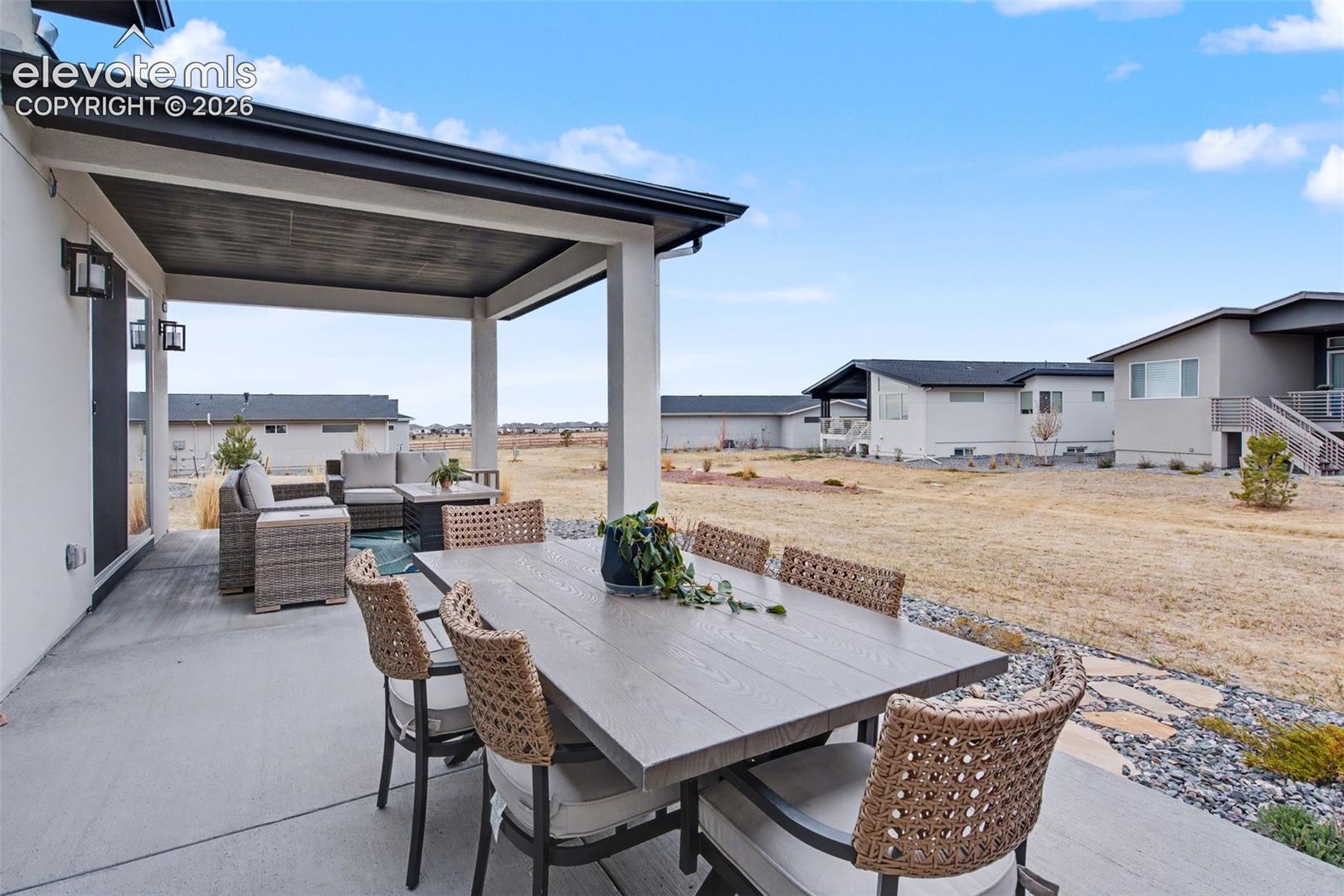 View of patio / terrace featuring an outdoor living / dining area