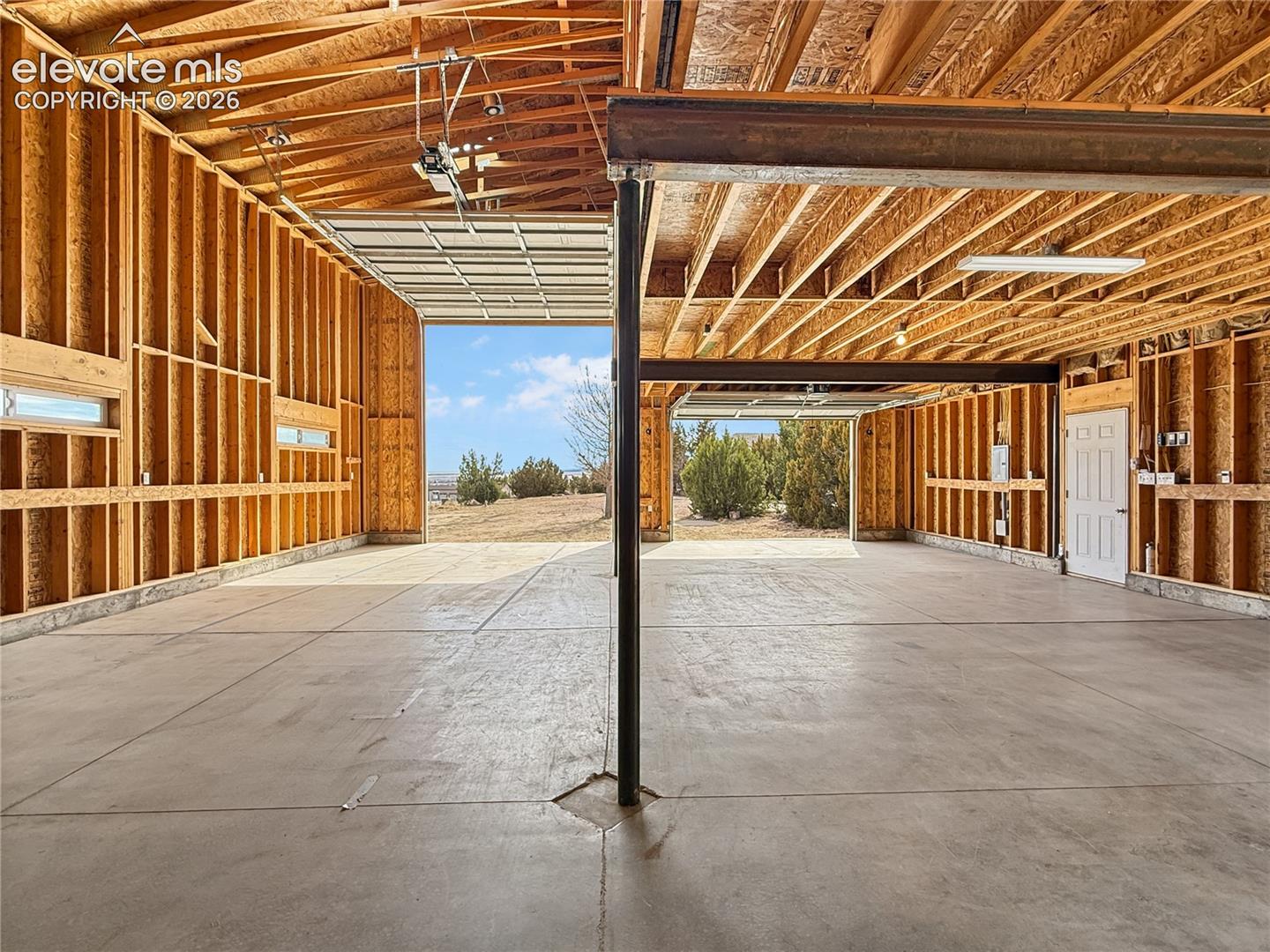 Detached garage looking from back to front, notice the extra large door for an RV/Boat