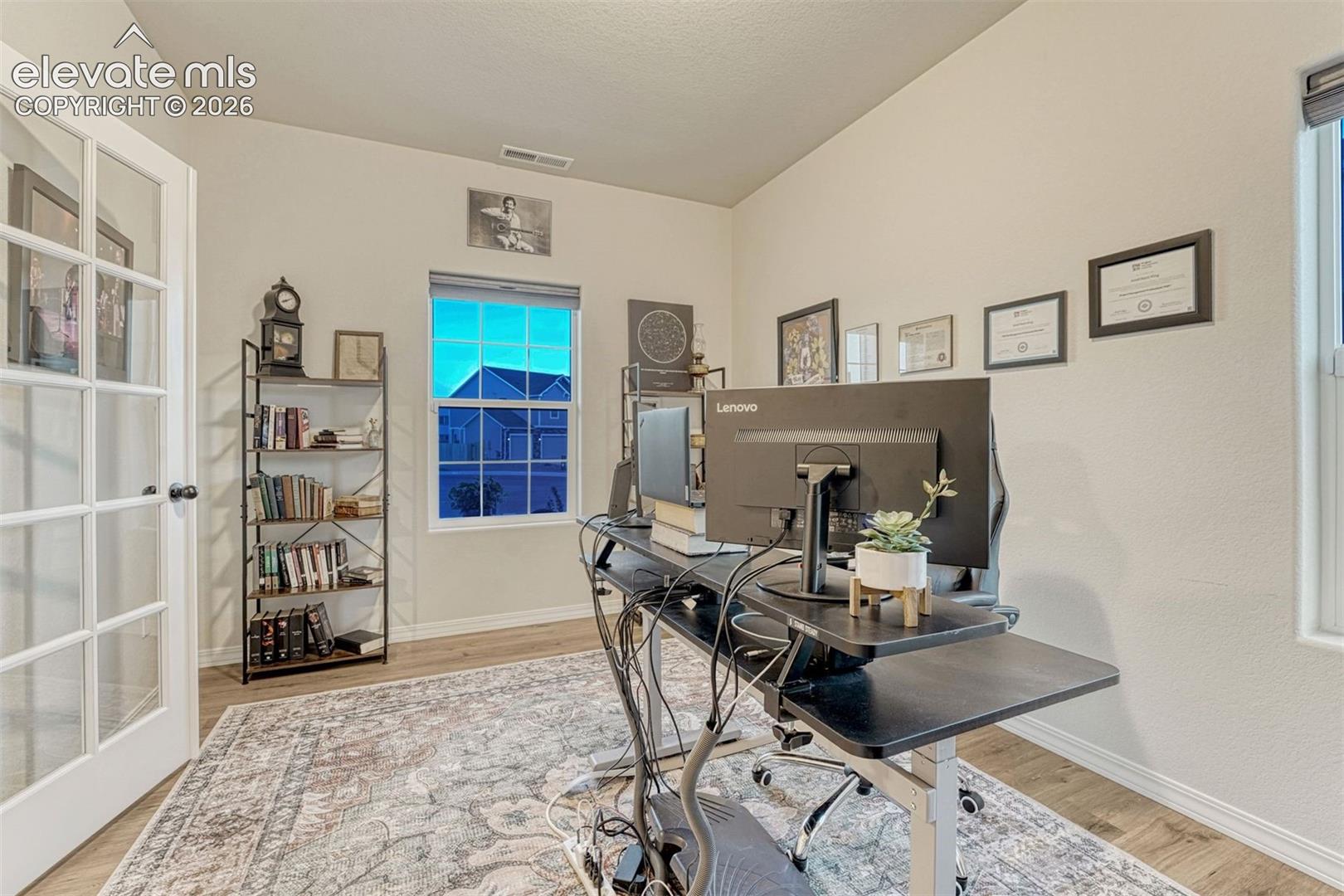 Roomy office located off the entrance foyer