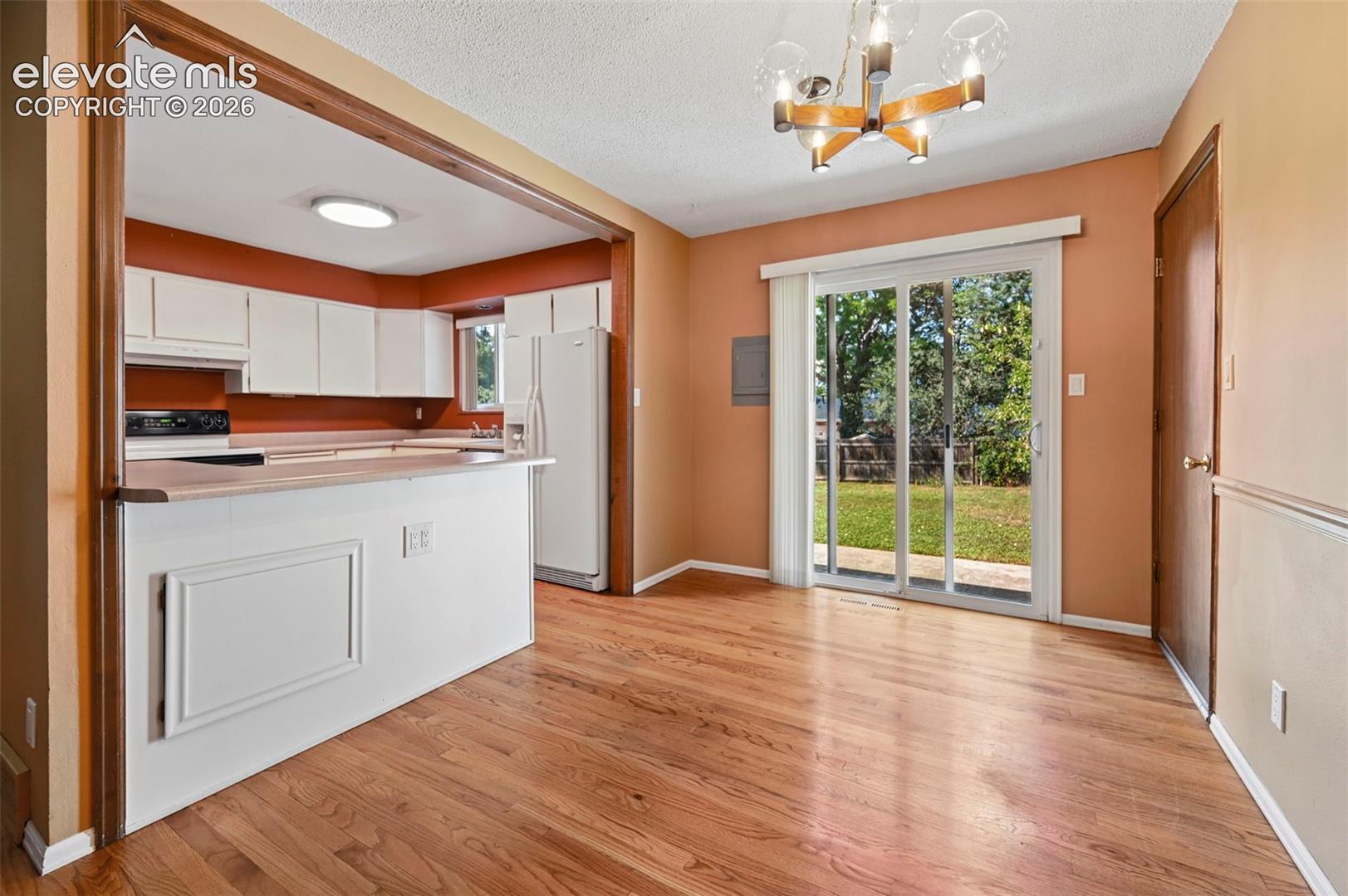 Dining area walks out to spacious back yard