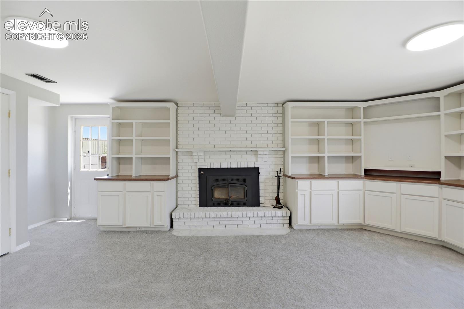 Carpet, Closets, Built Ins, Fireplace, Dry Bar