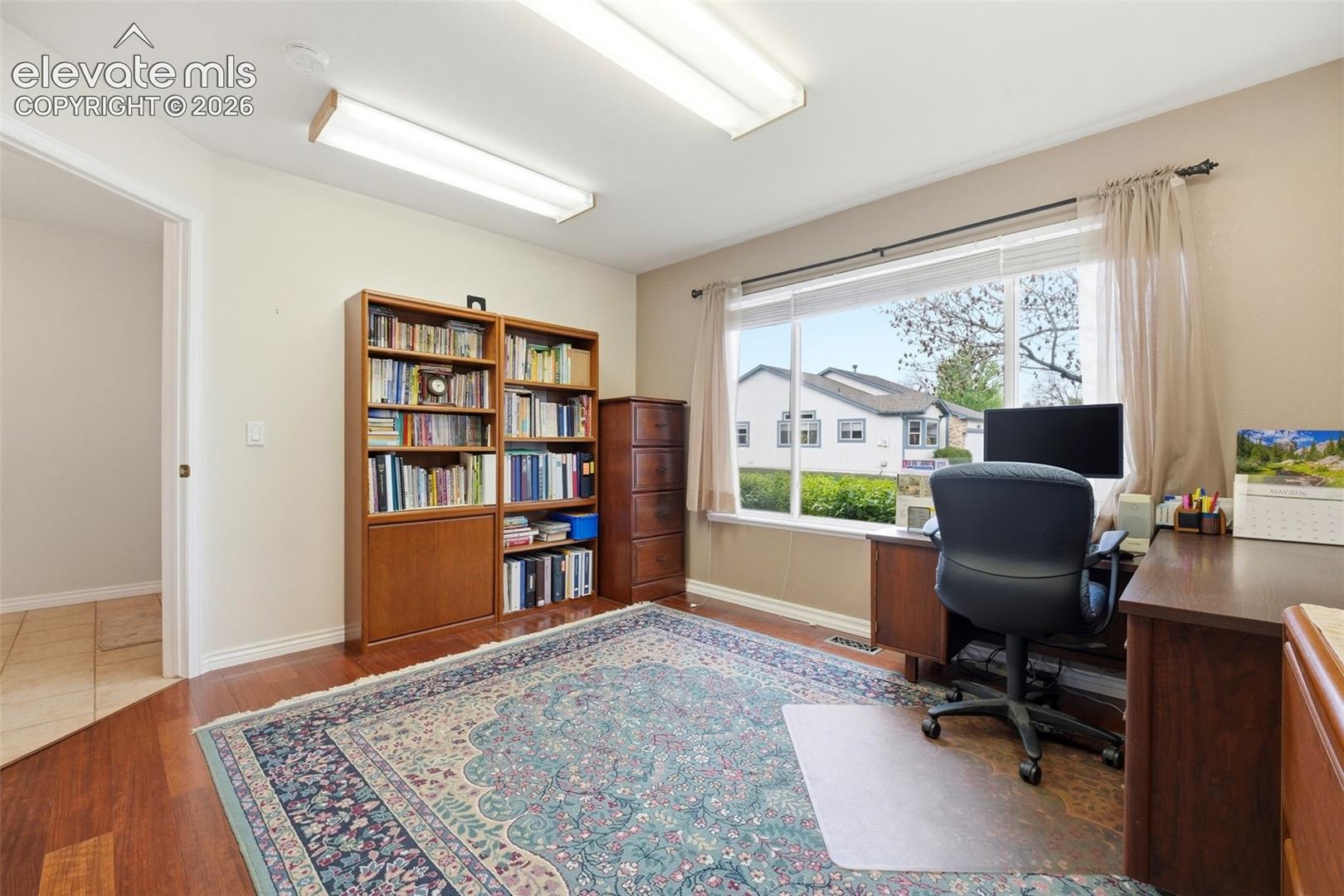 Second bedroom on main level  with walk in closet, currently used as an office.