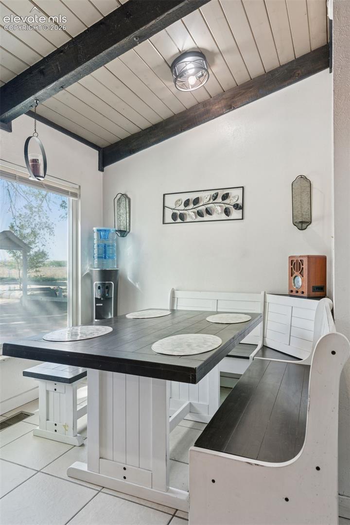 Dining area featuring built-in bench seating and a dedicated space for everyday meals or casual gatherings