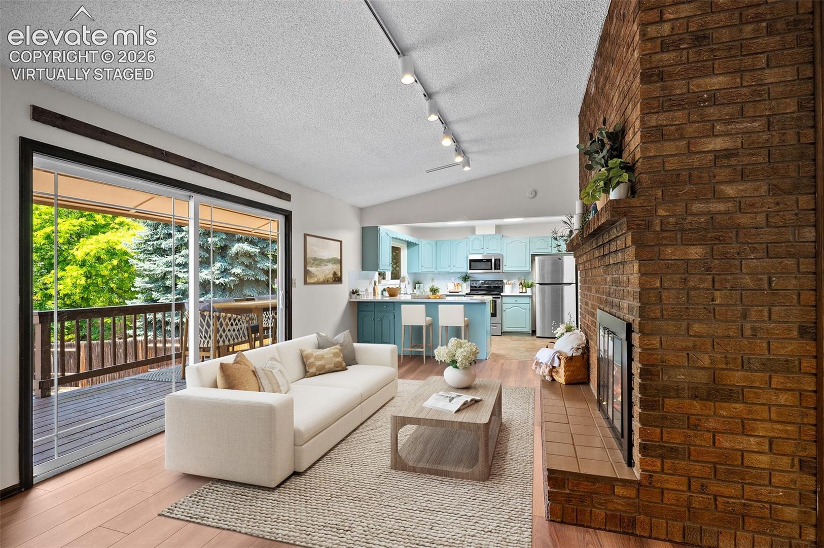 Virtually Staged; Upper Den & Kitchen