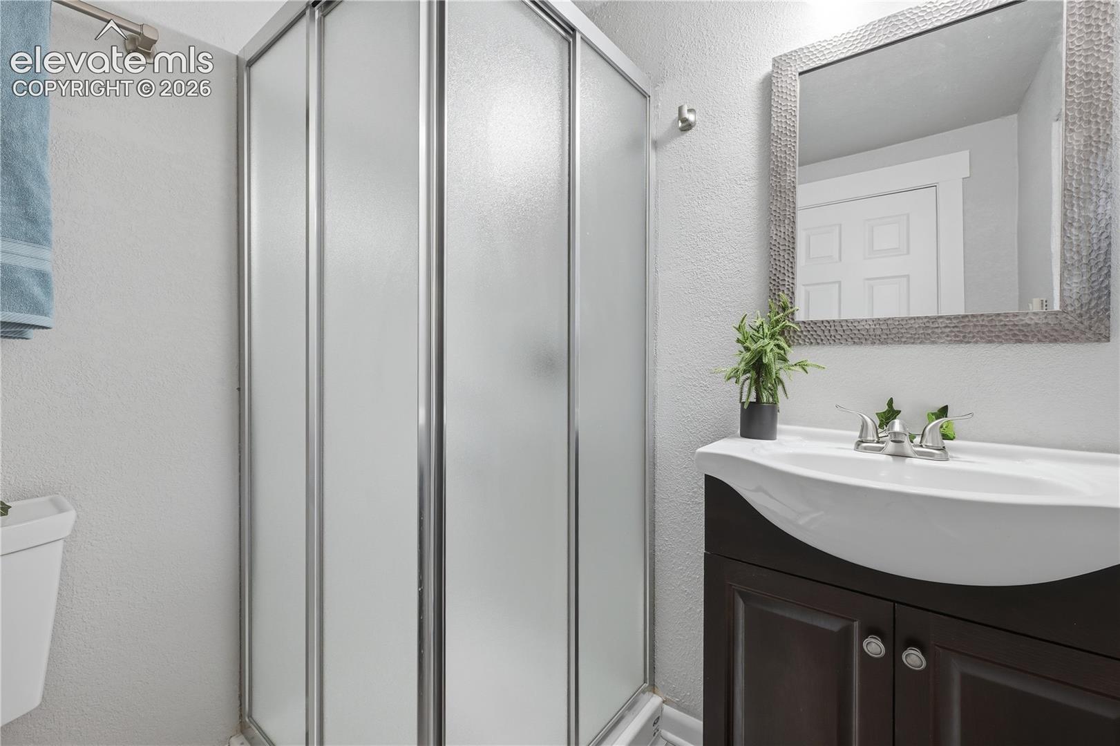 The apartment bathroom that has been totally remodeled.