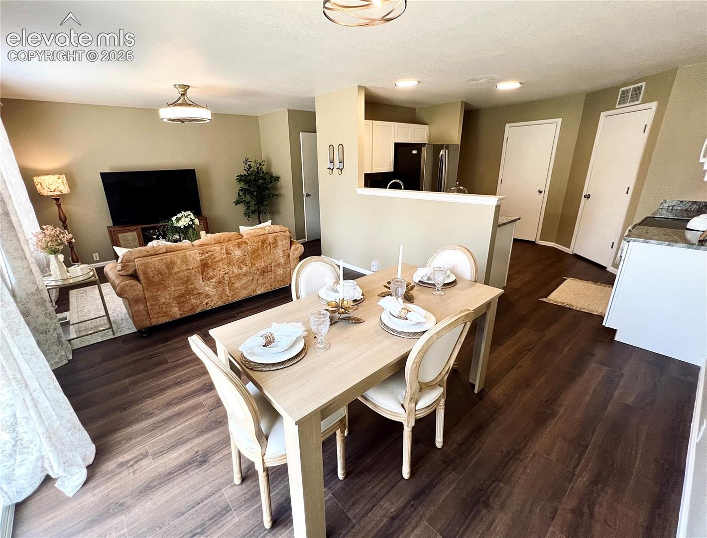 Open Concept Living Room + Dining Area!