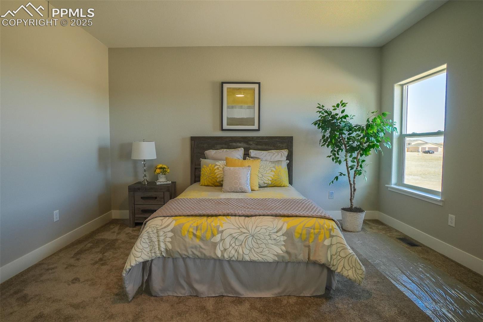 Bedroom featuring carpet flooring