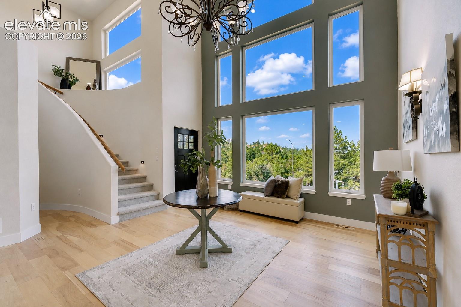 Dramatic floor to ceiling windows with amazing views in the Living Room.
