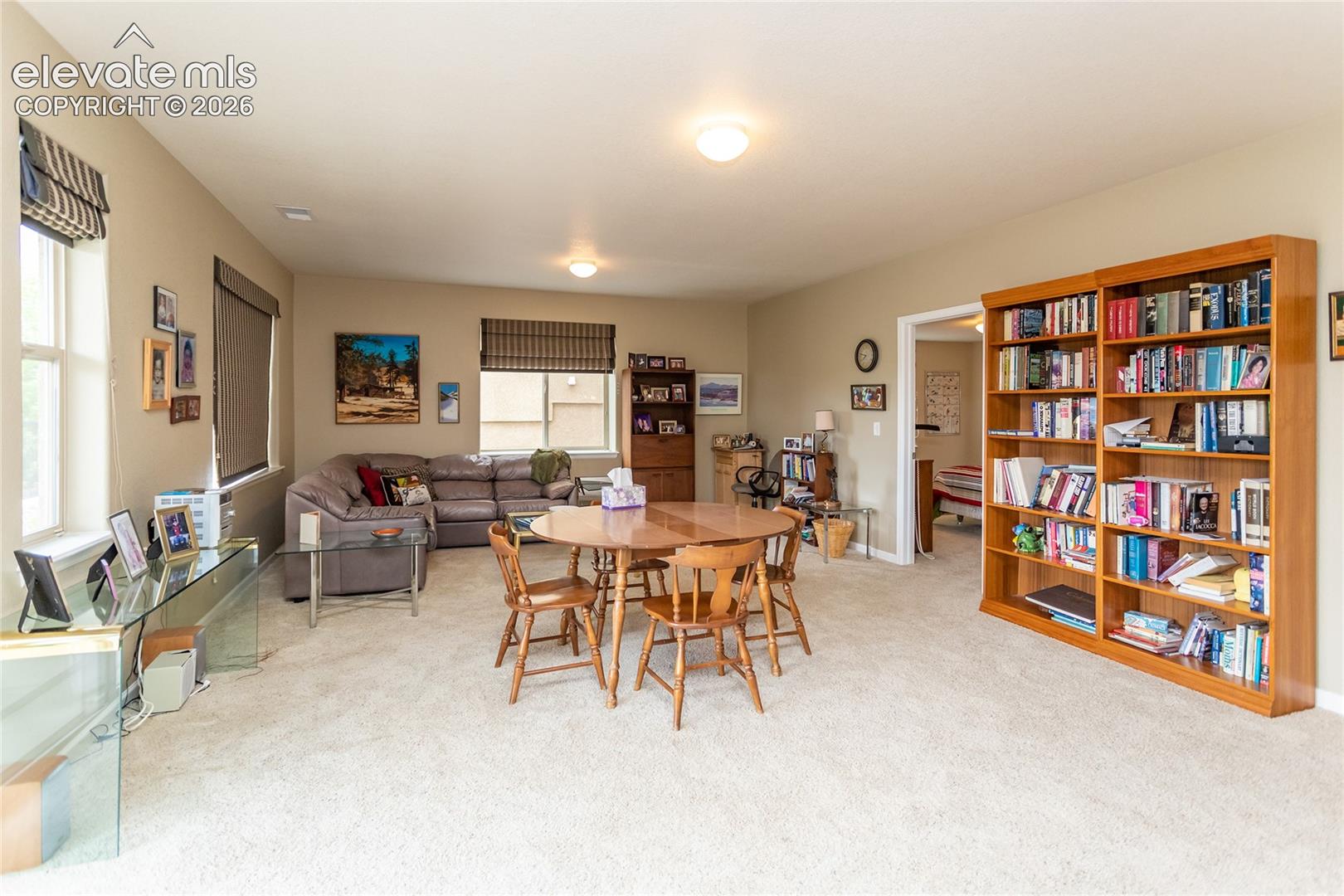 Spacious family room...plenty of room for games & movie watching.