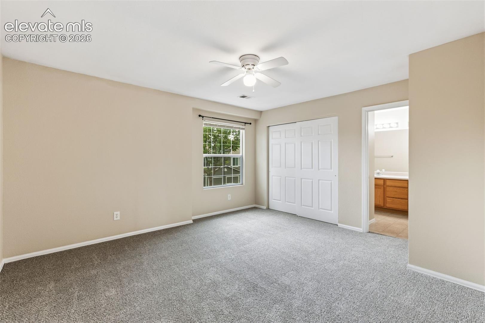 The Primary Bedroom features an ensuite bathroom with a double vanity sink!