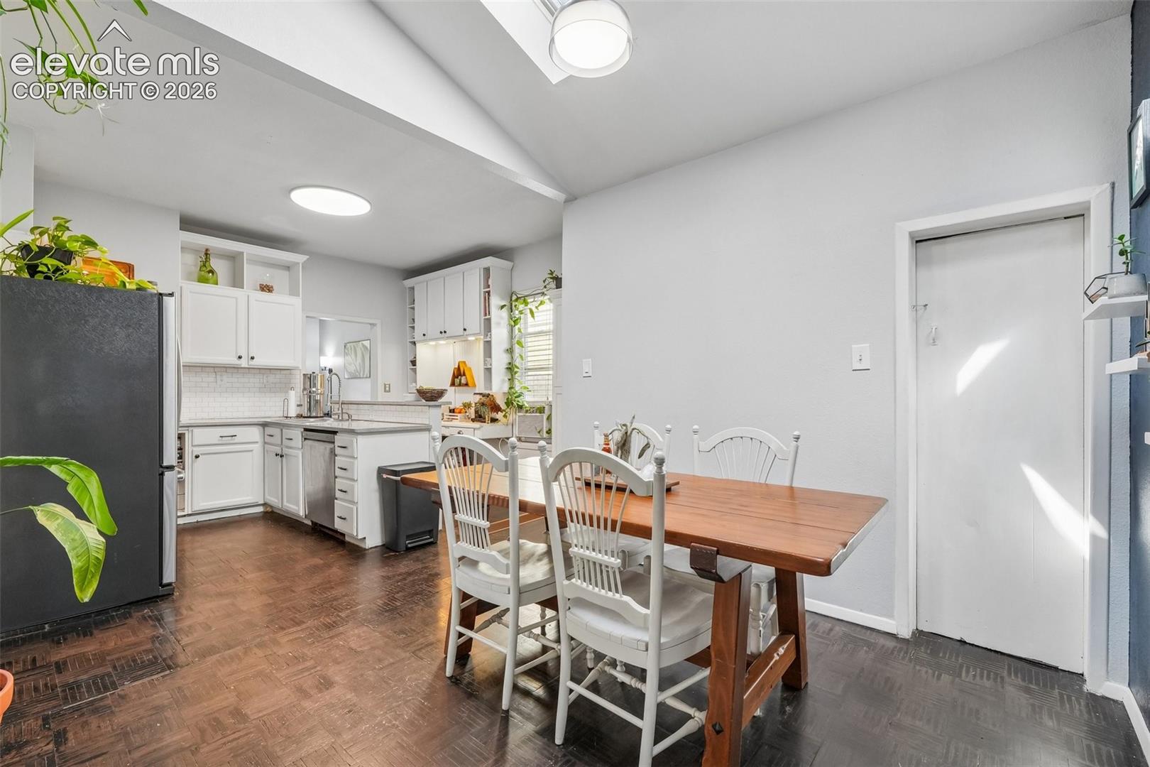 Dining area with skylights