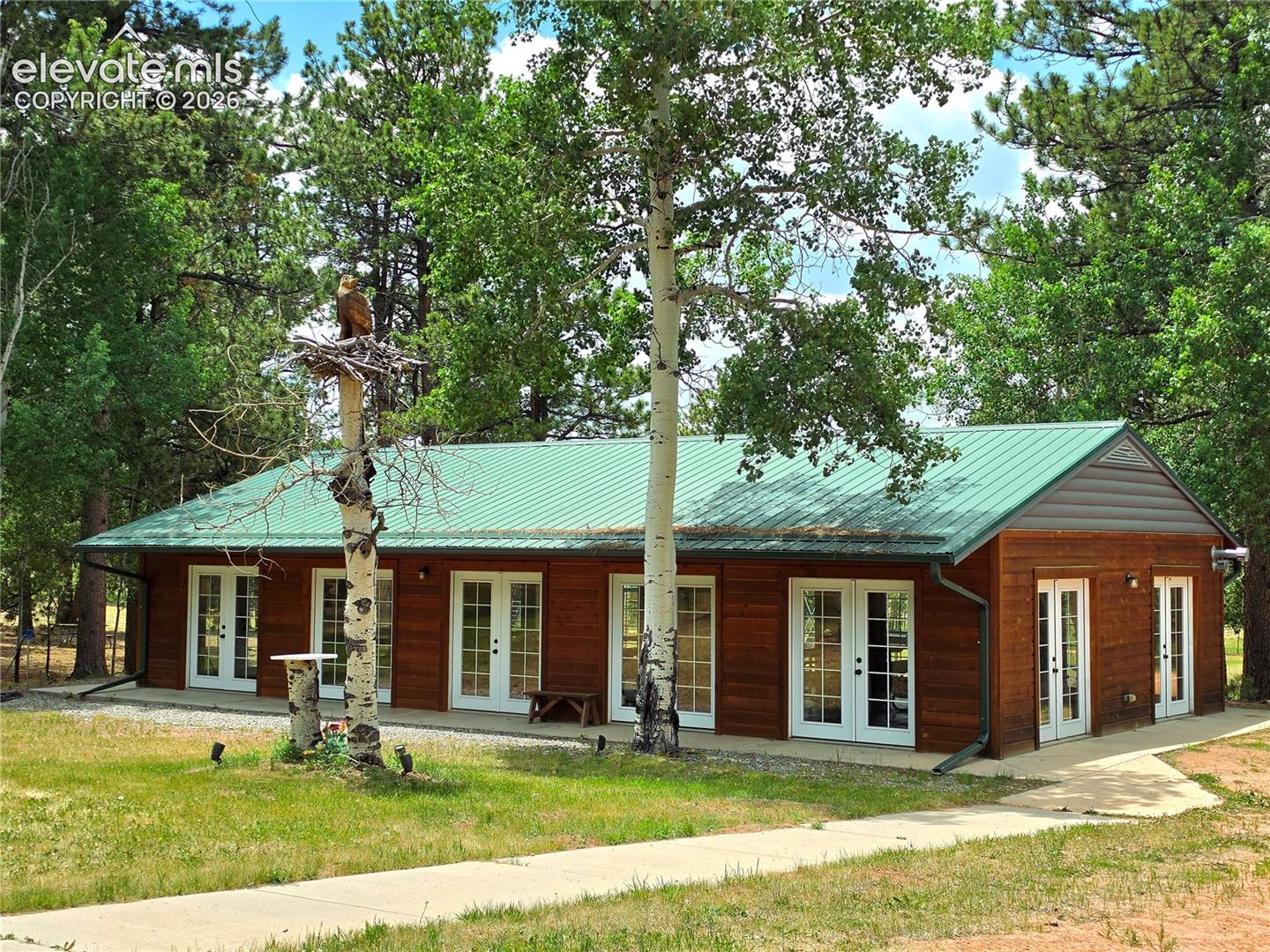 Enclosed Pavilion with 14 sets of French Doors with heat and electric.