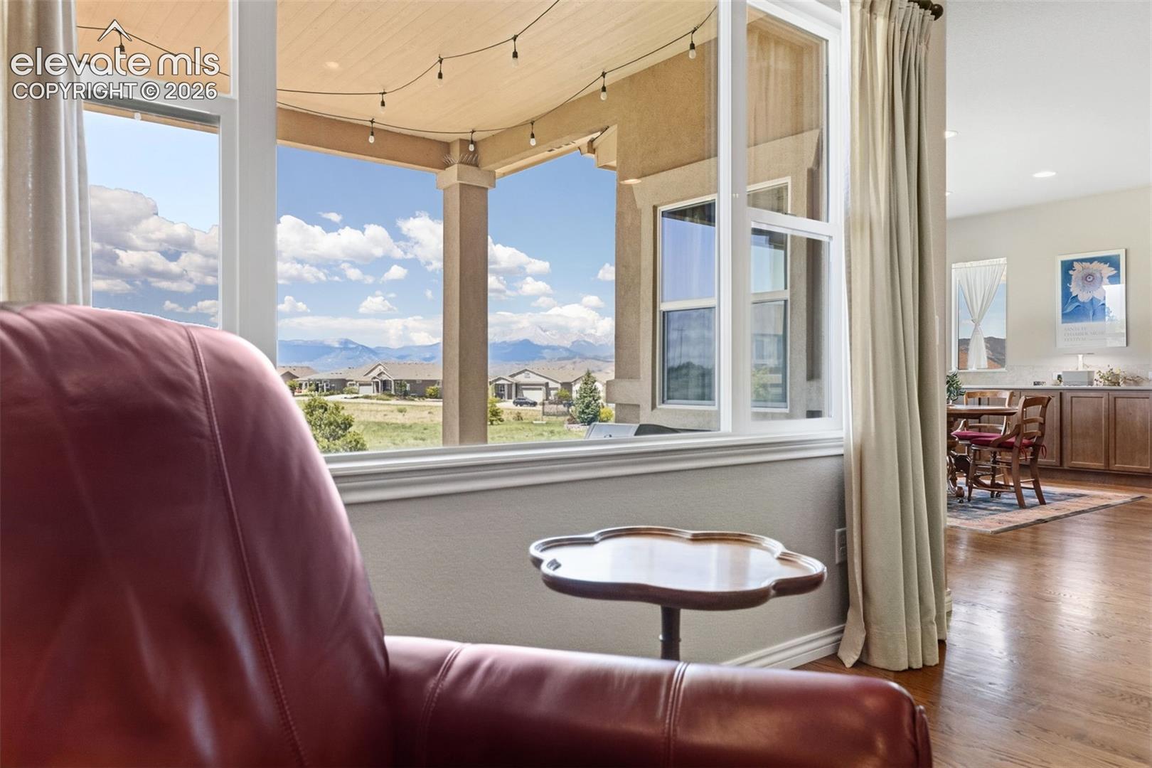 Relax in the living room while enjoying unobstructed views of Pikes Peak