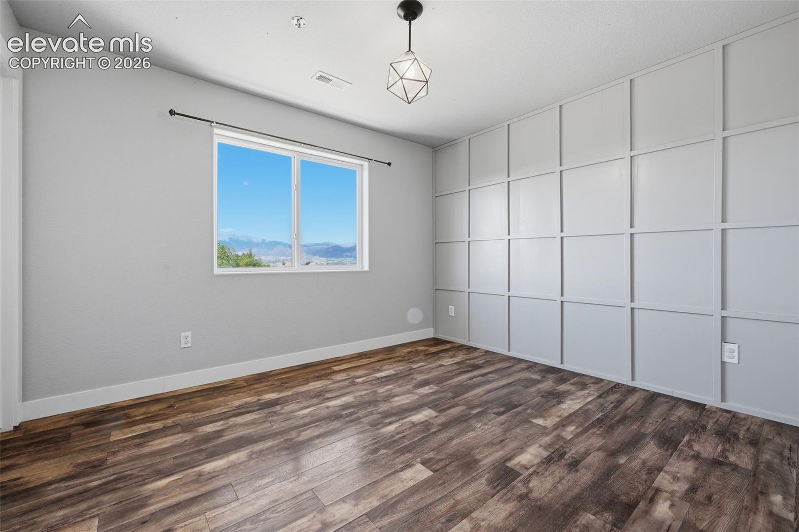 Another focus wall and more plank flooring in bedroom 4!  