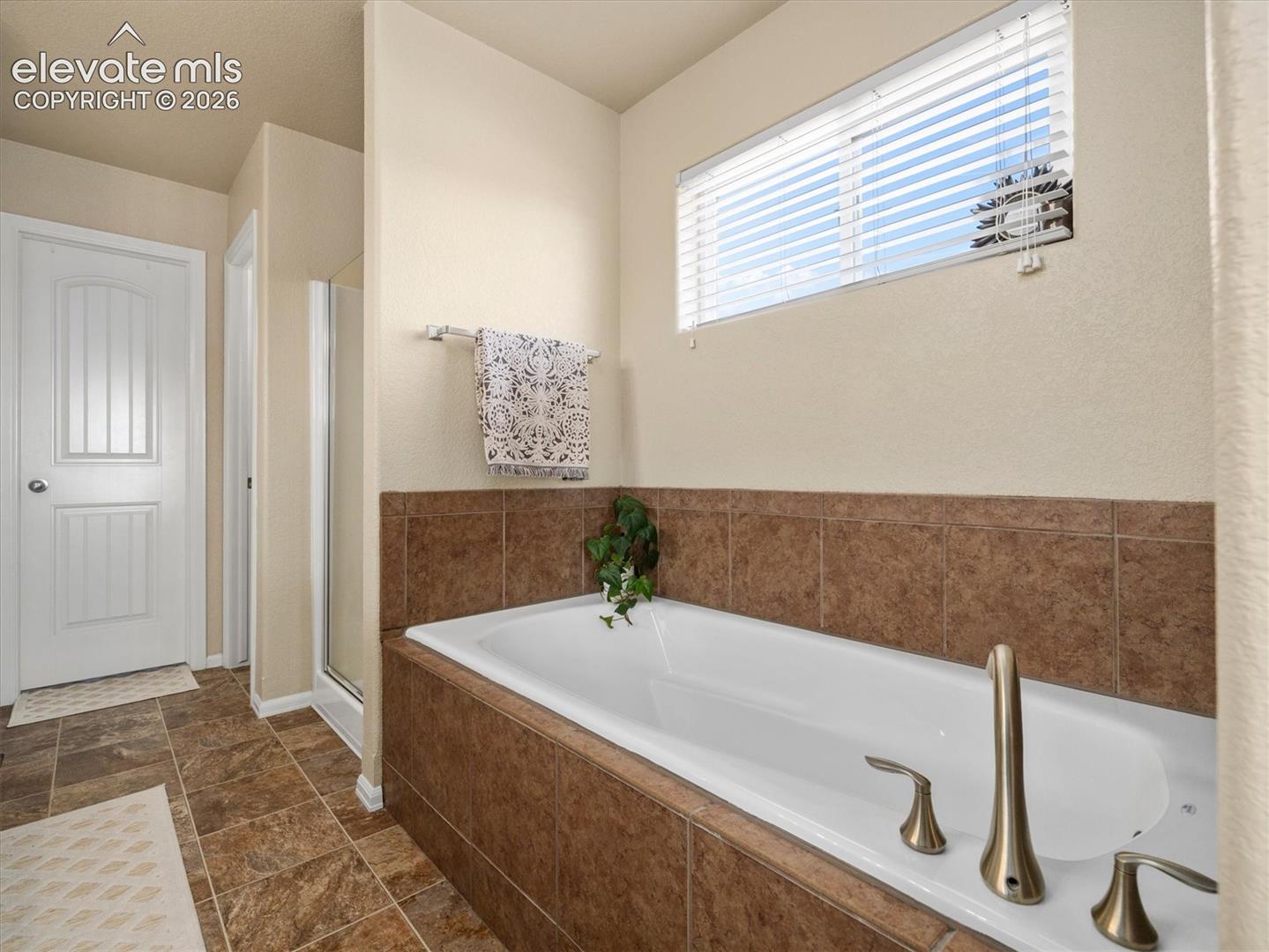 Soaking tub. Walk-in shower.