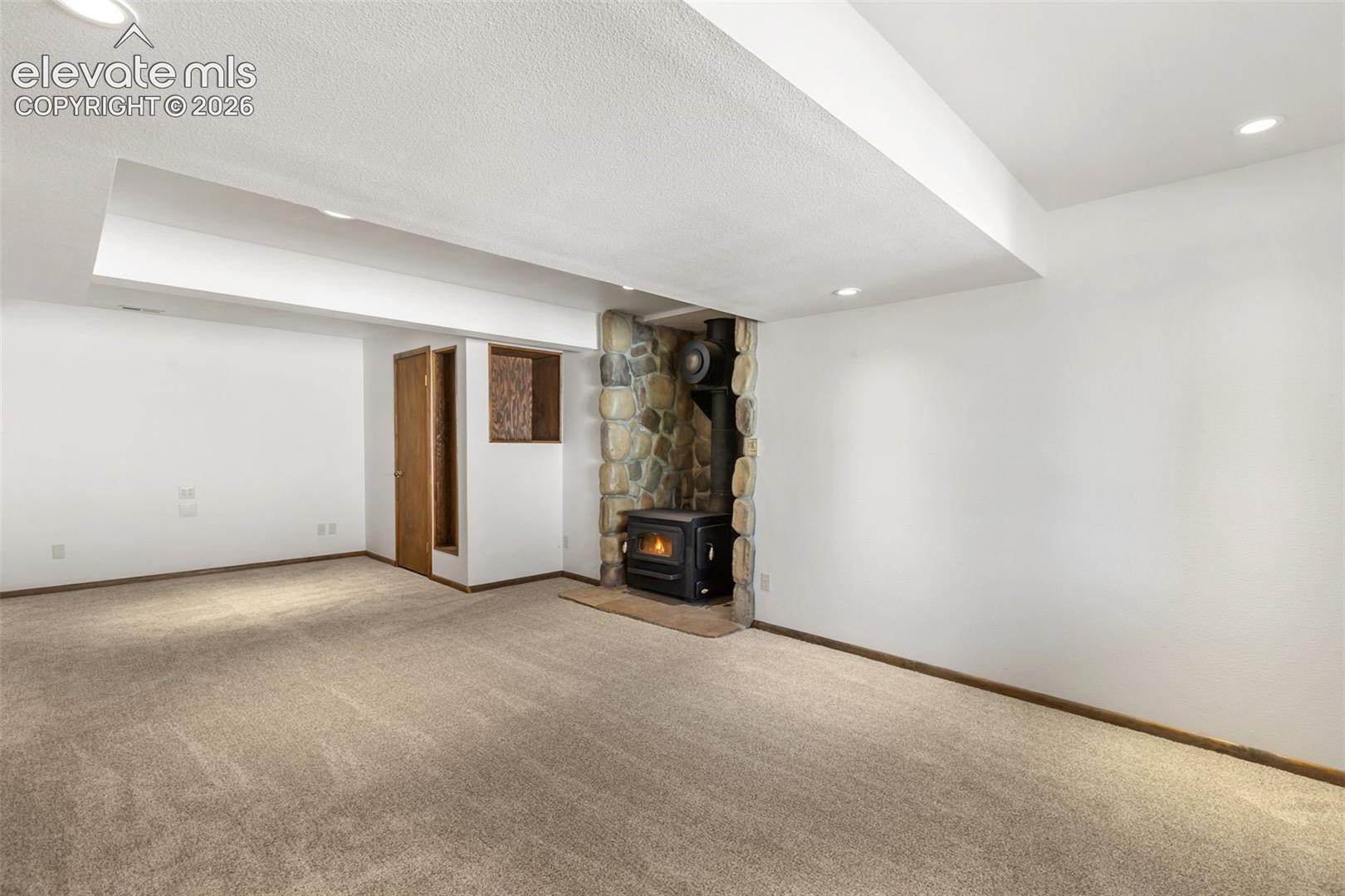 Family room with cozy wood stove.