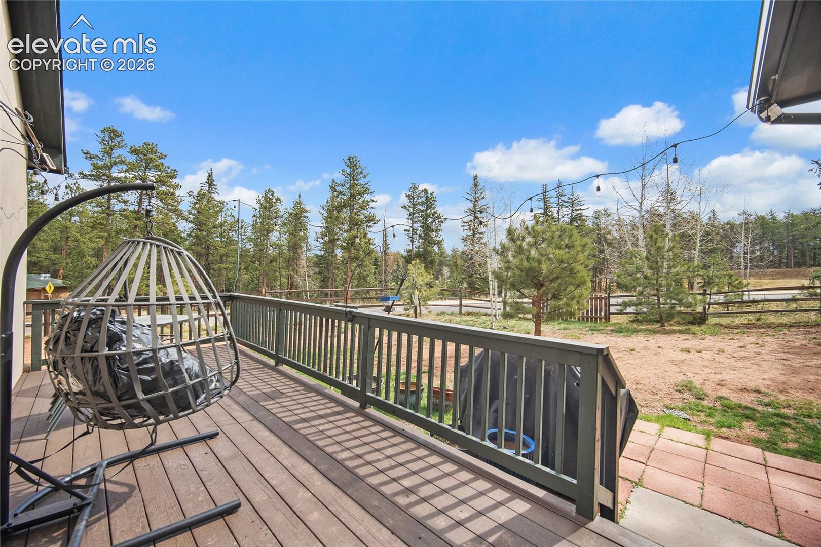Deck with forest and mountain views
