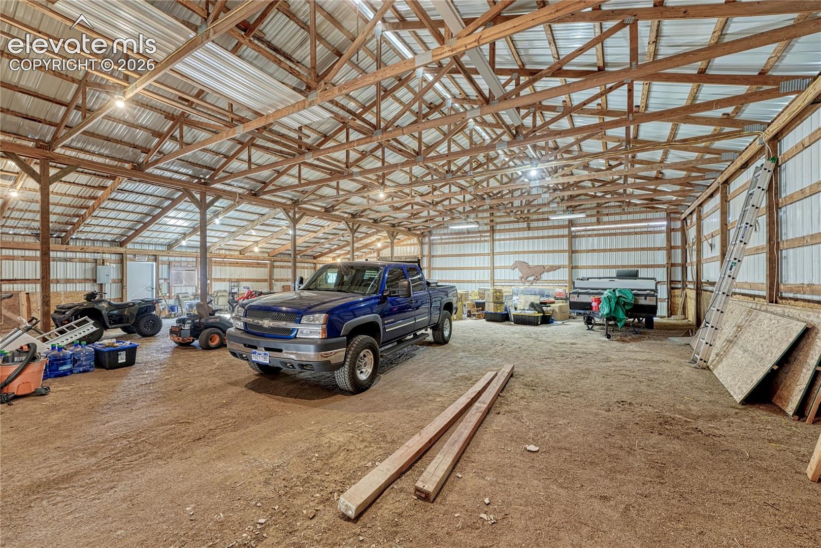 Barn has plenty of room for vehicles and equipment
