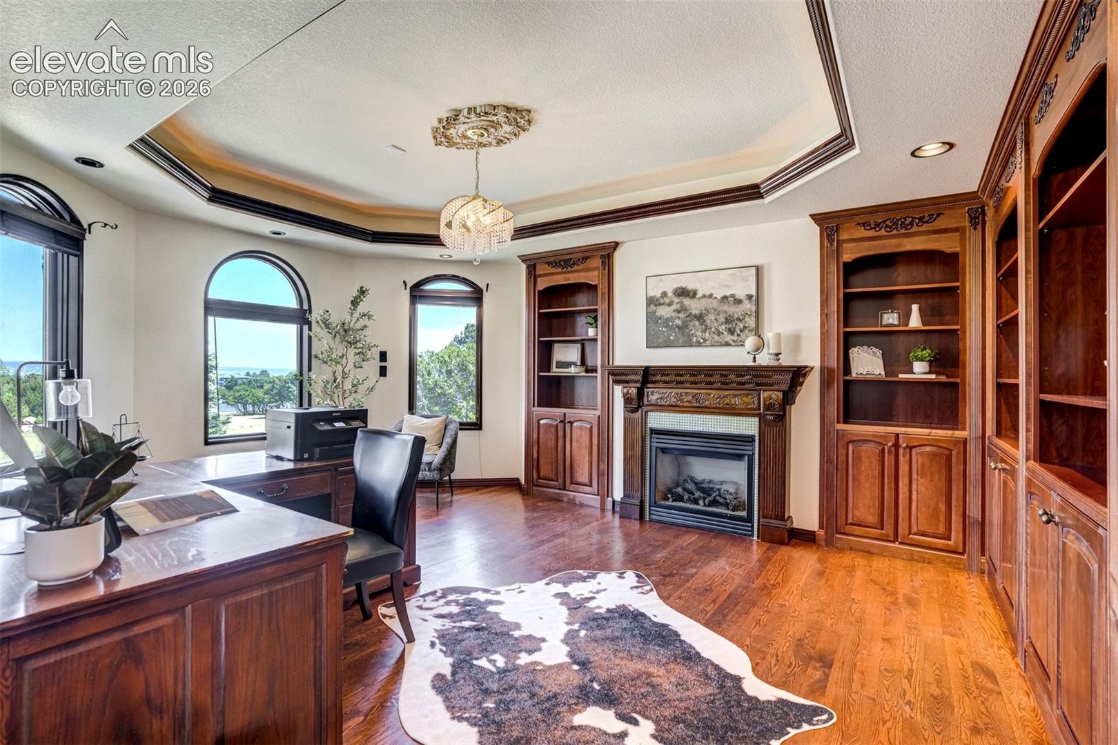 Main level office with handcrafted woodwork that deserves the spotlight. 