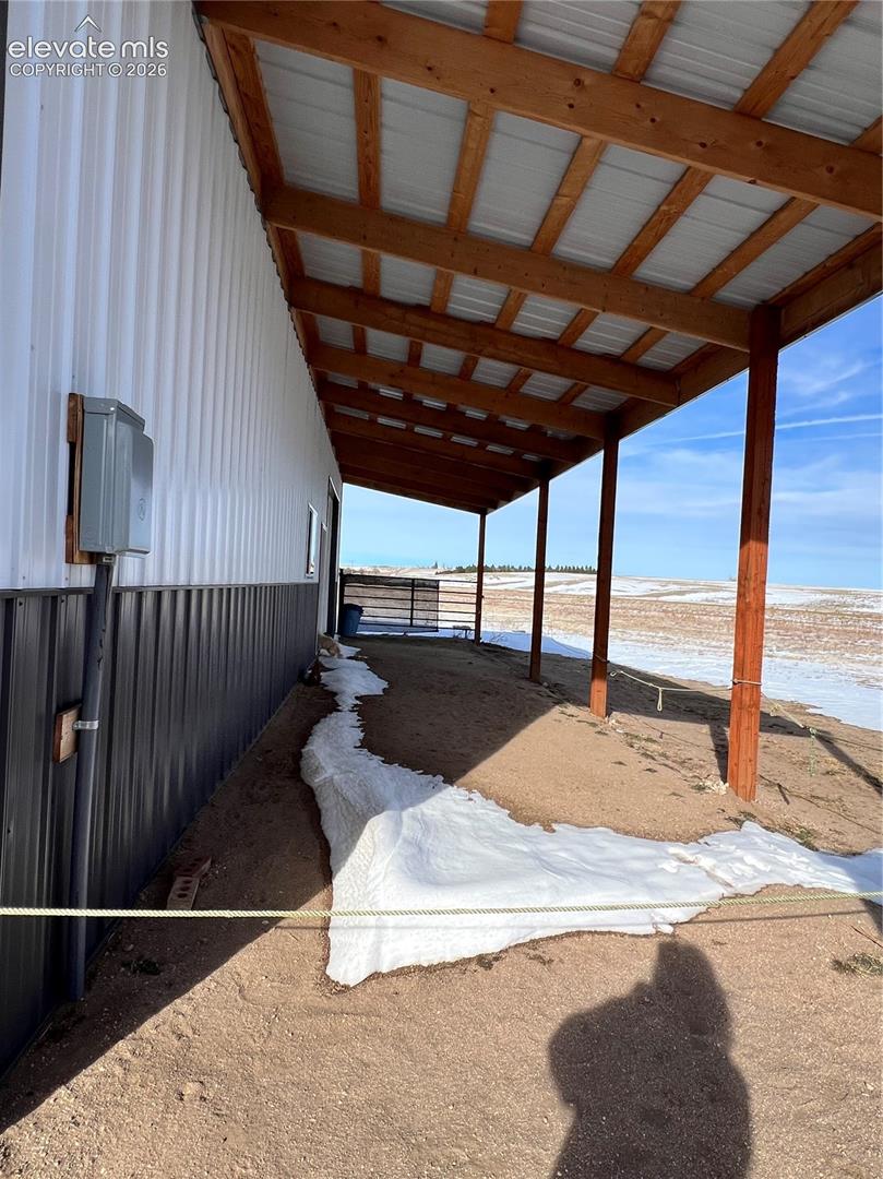 30x50 Barn Brothers structure with 12x50 covered overhang