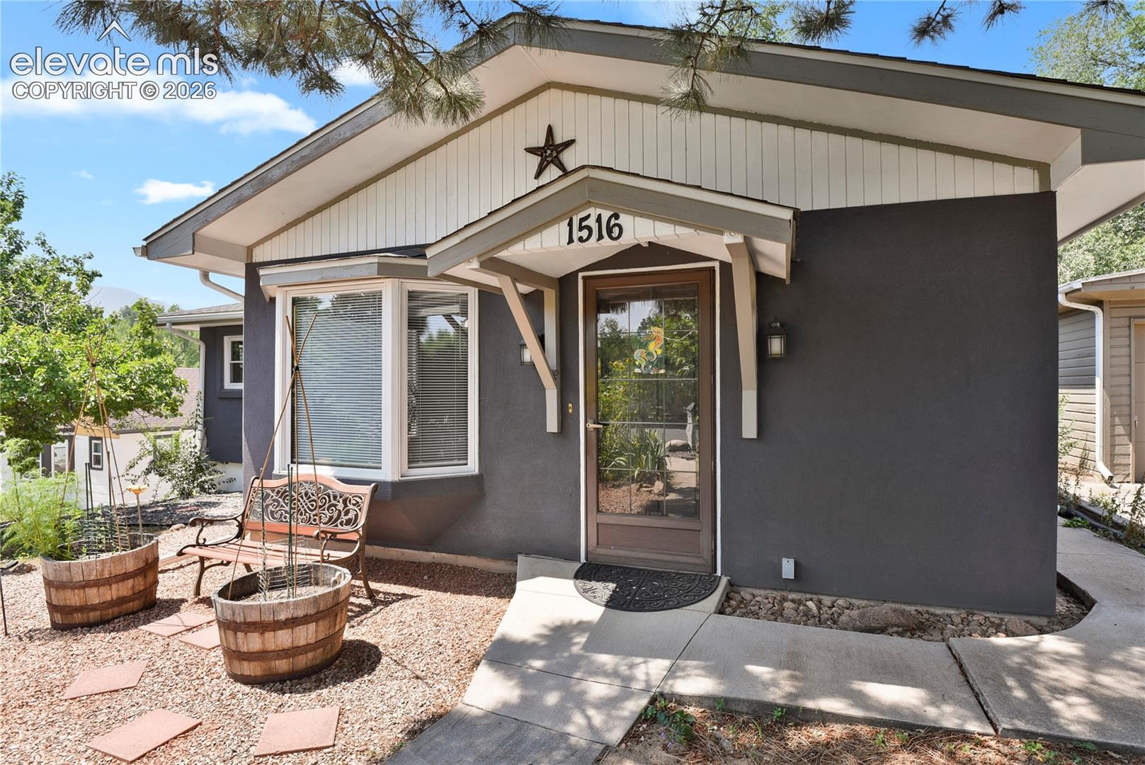 Charm, character, and room to make it your own in the Ivywild neighborhood! This 3-bedroom, 1.5-bath home welcomes you with a large, bright sunroom and hardwood floors throughout the main level. The upgraded kitchen features quartzite countertops, while the partially finished basement offers flexible space and possibilities for the next owner.Outside, enjoy a large, fully landscaped lot and garage space that is hard to find: one attached garage space plus an oversized two-car detached garage with a separate electrical panel and 220V wiring. A neighborhood park is nearby, along with local dining and downtown Colorado Springs. The driveway has a recorded easement with the neighboring property. Come see the charm and potential this Ivywild home has to offer!