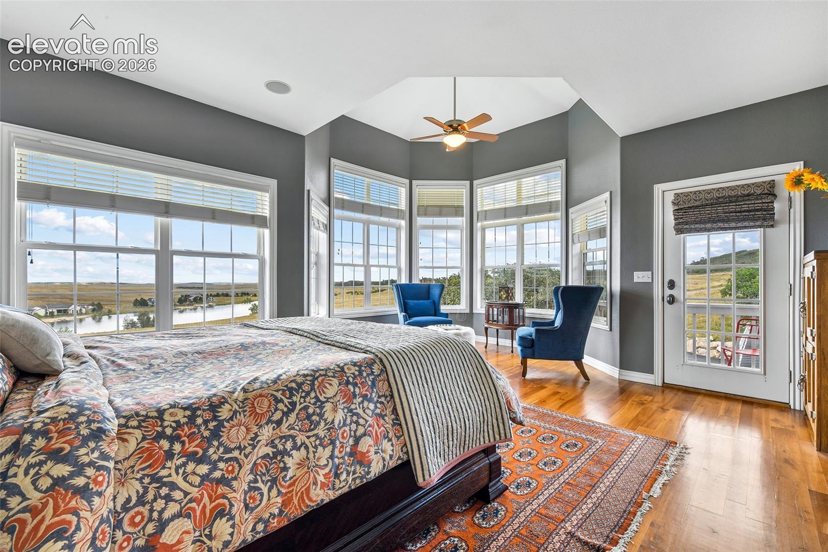 Primary suite with VIEWS, polygonal sitting area, cherry flooring, private balcony...