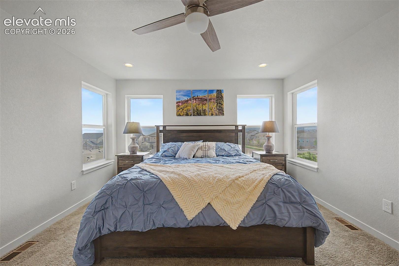 The primary bedroom provides spectacular mountain views!