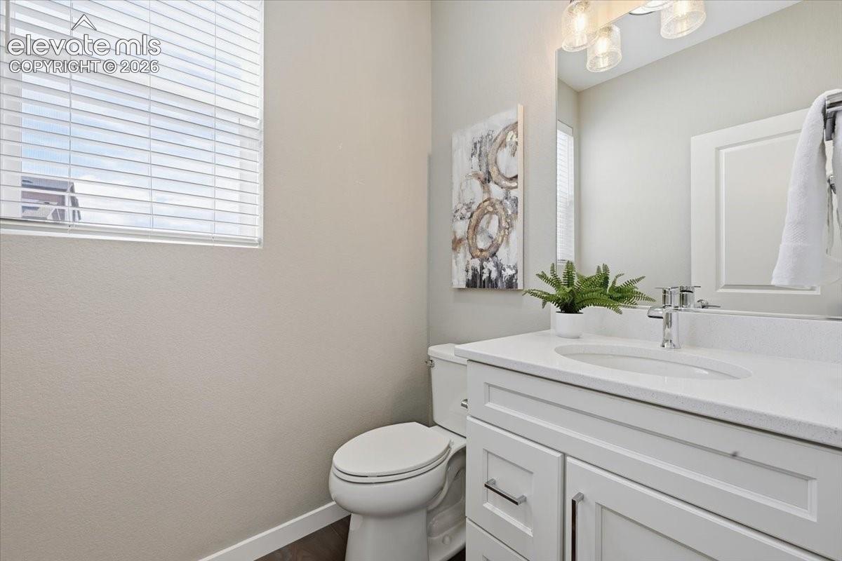 Powder bath on the main level with quartz counters!