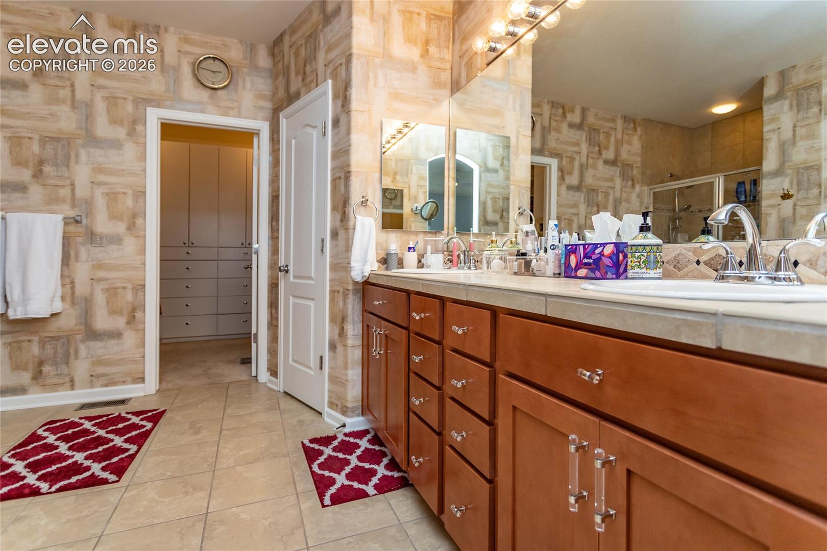 Spacious with double sinks, room for all of your personal items.