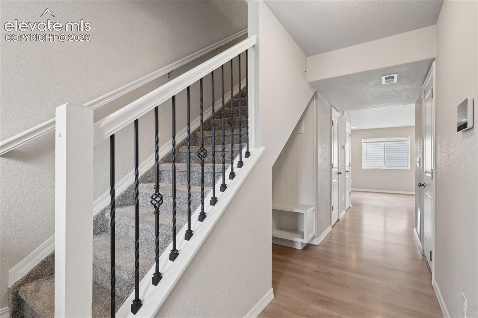 You are welcomed inside the front door by luxury vinyl flooring and natural lighting which flows through the home's abundance of windows!