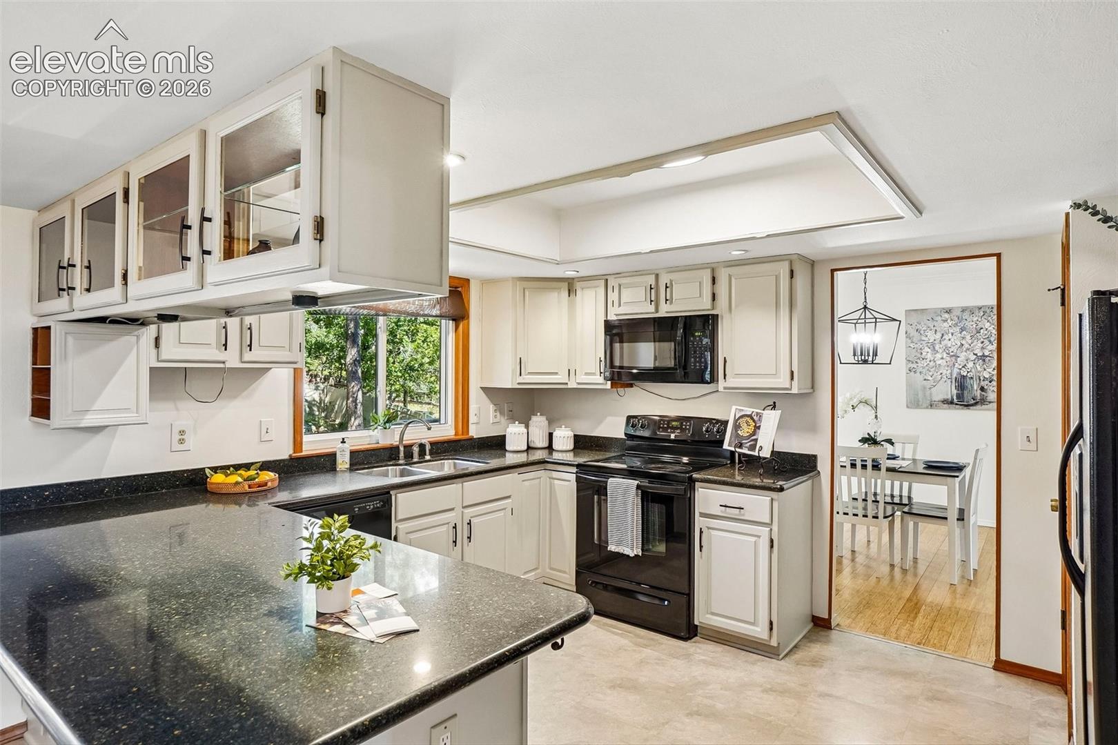 Kitchen features quartz countertops.