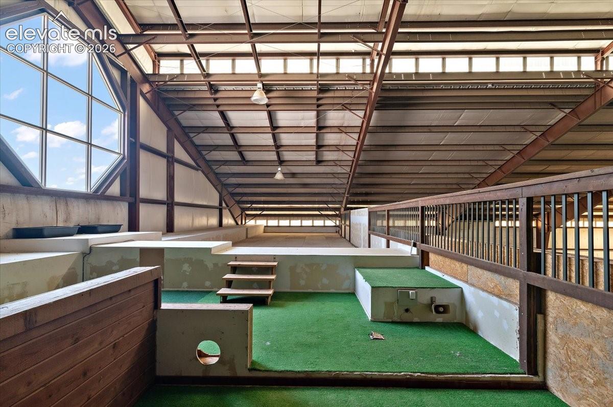 Upper level overlooking tennis court and arena.