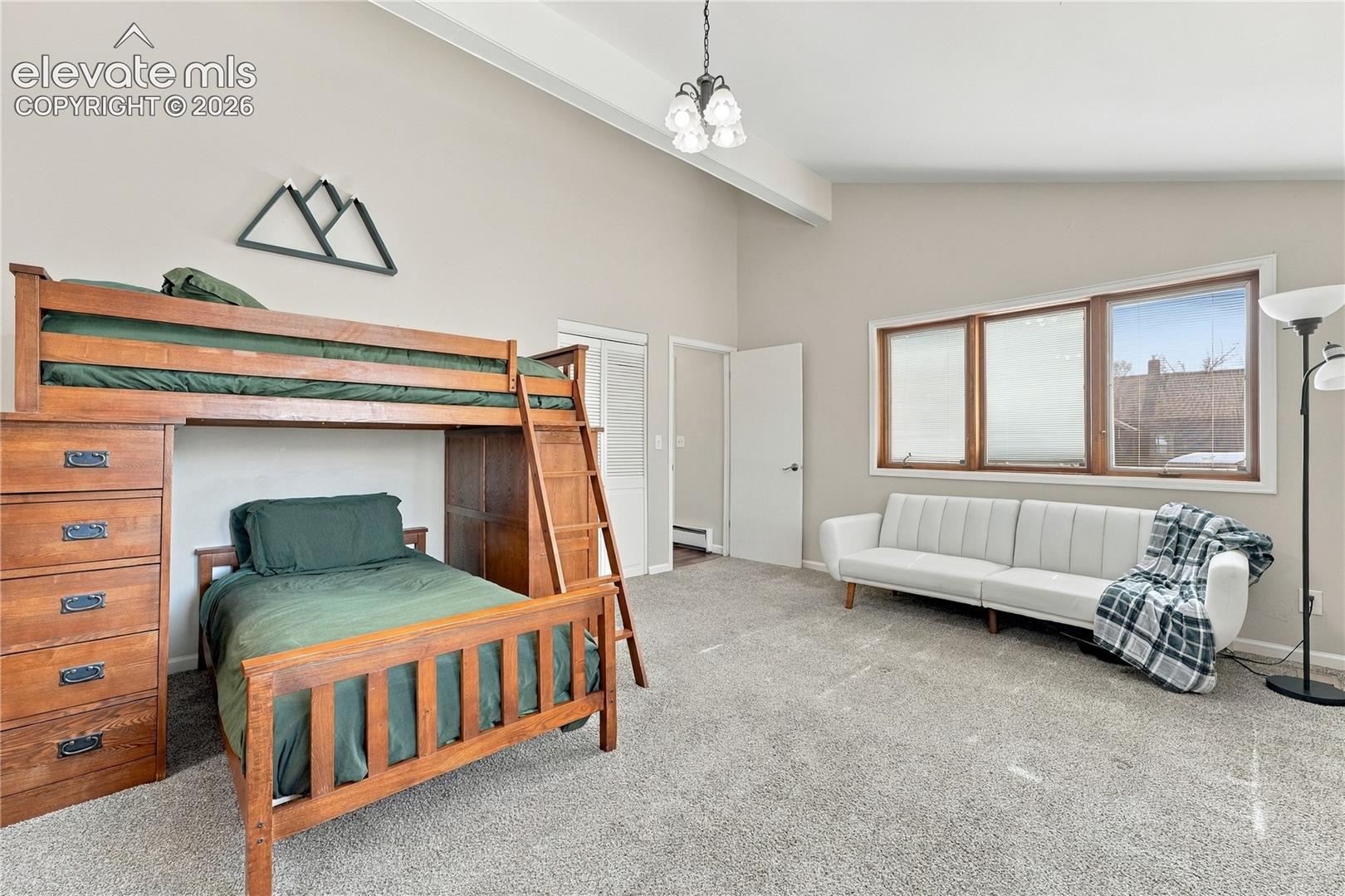 Second Bedroom main floor, with walk in closets and private access to second bathroom