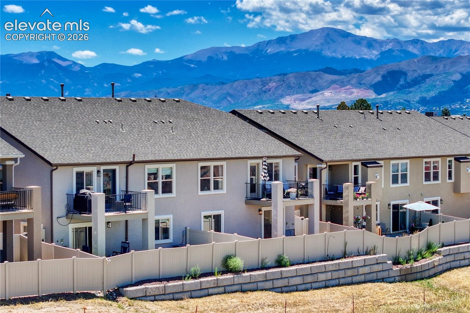 Enjoy stunning Pikes Peak and mountain views from this peaceful patio home located within a quiet and welcoming community.