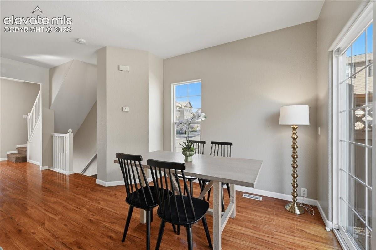Hardwood flooring throughout, providing a bright and airy atmosphere