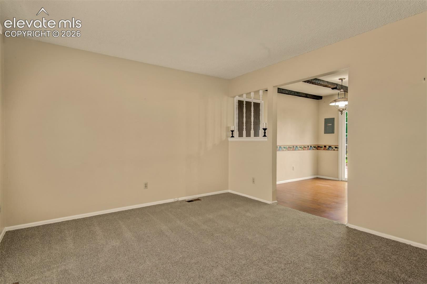 Living Room with Neutral colors and brand new carpet
