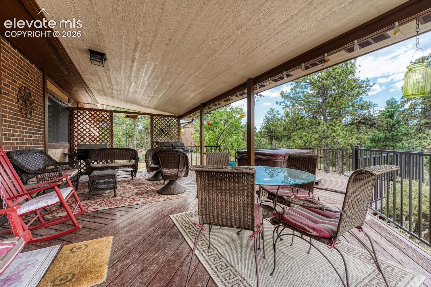 Covered deck off the Dining Nook for outdoor dining and relaxawtion.