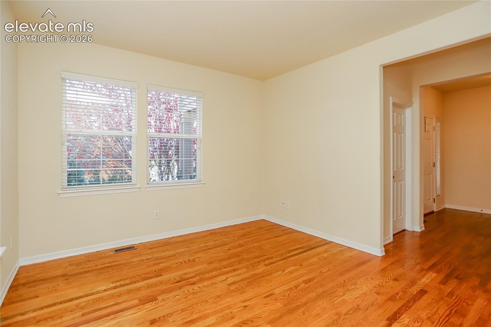 Another angle of the front living room with view of the foyer.