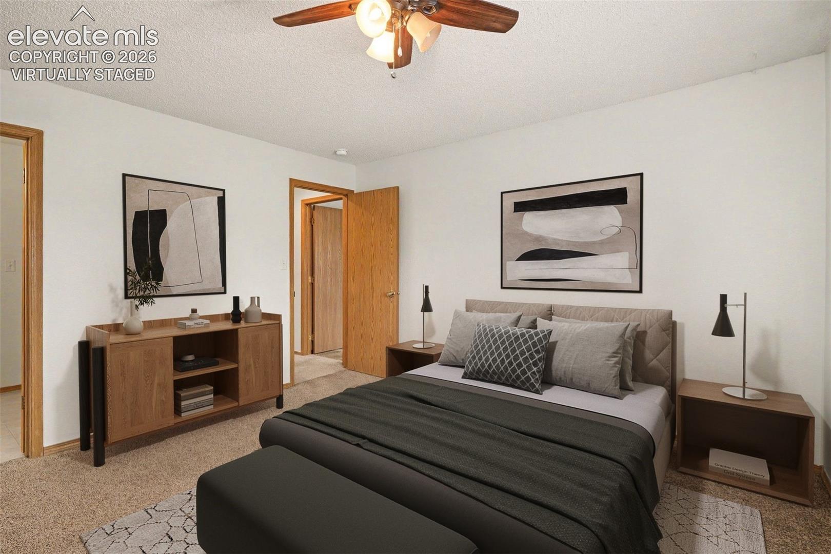 Virtually staged bedroom with adjoining bathroom