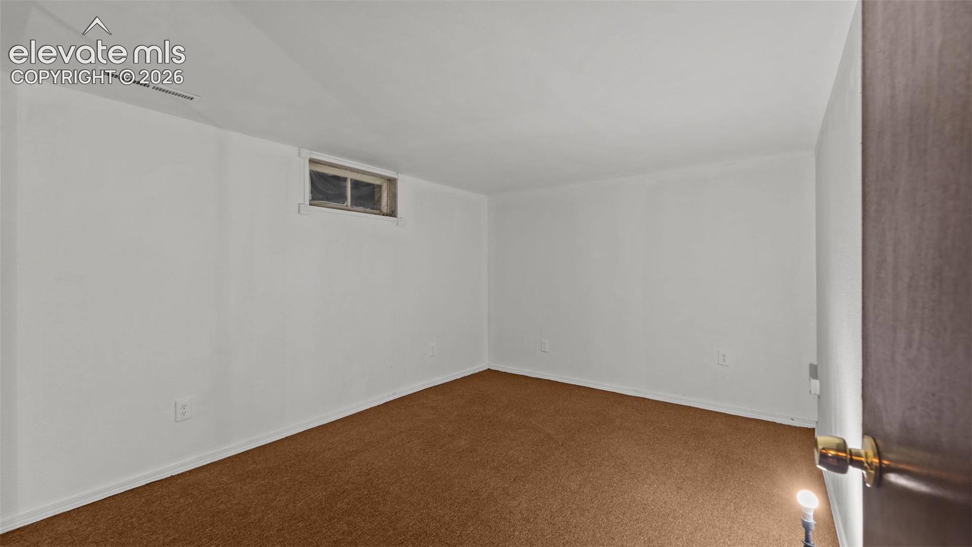 White walls with a single window