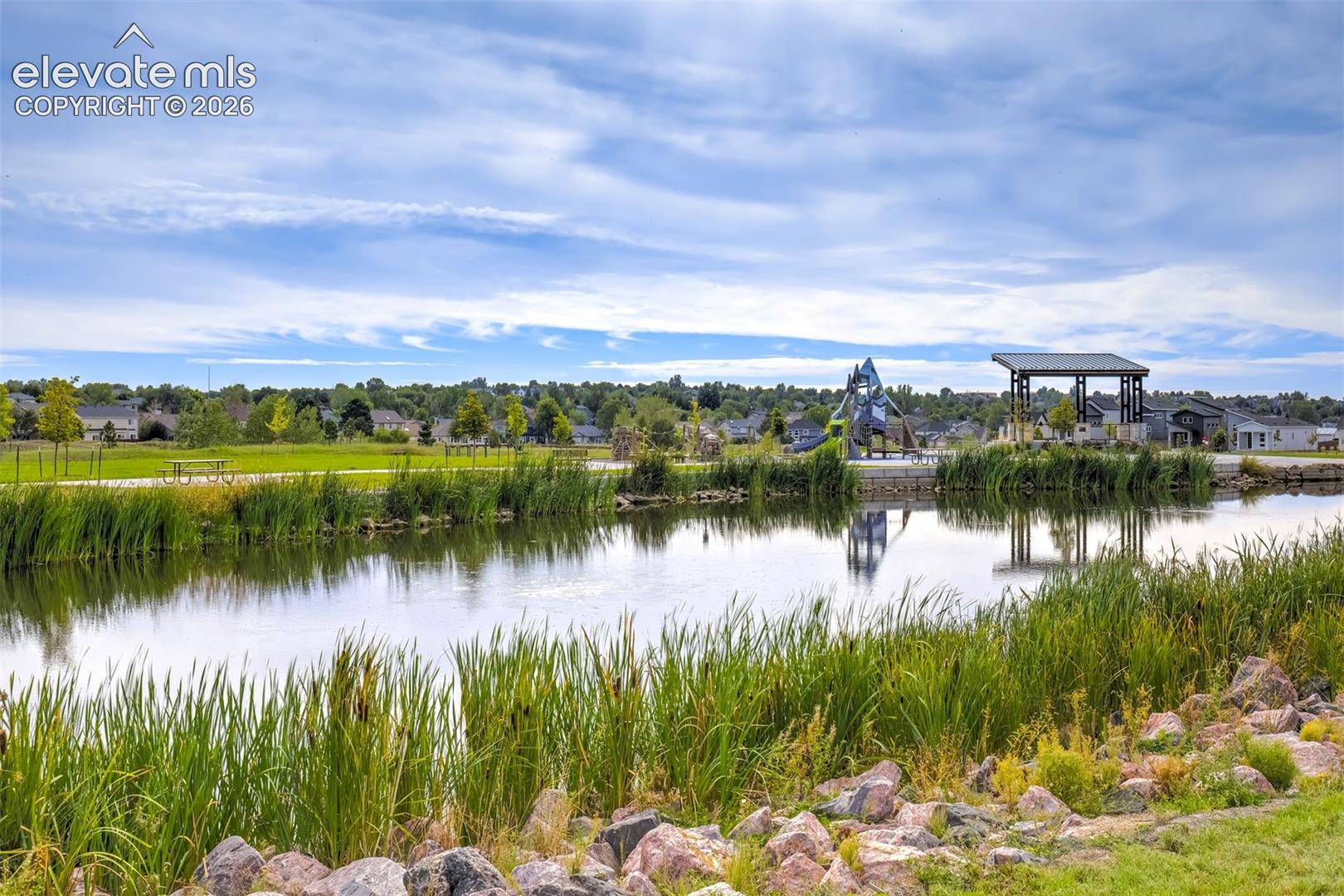 Beautiful pond, park, and event pavilion with walking path