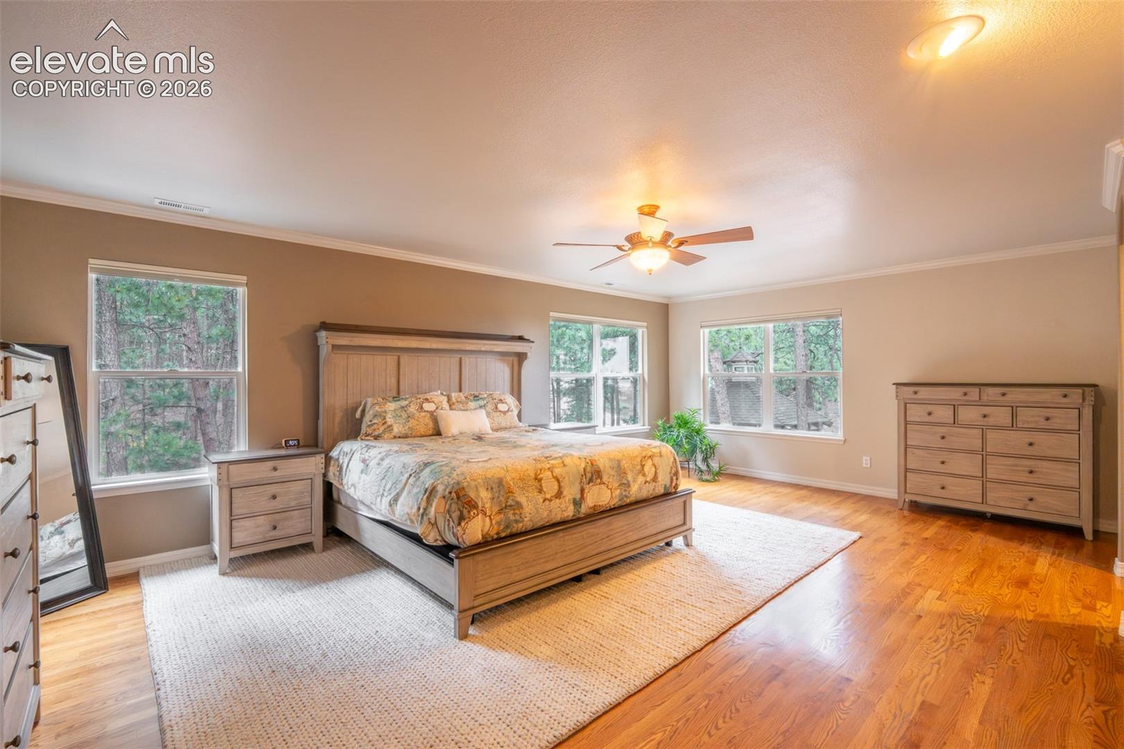 Primary bedroom (1) with fireplace, double walk in closet, and ensuite 5 piece bath - upper level