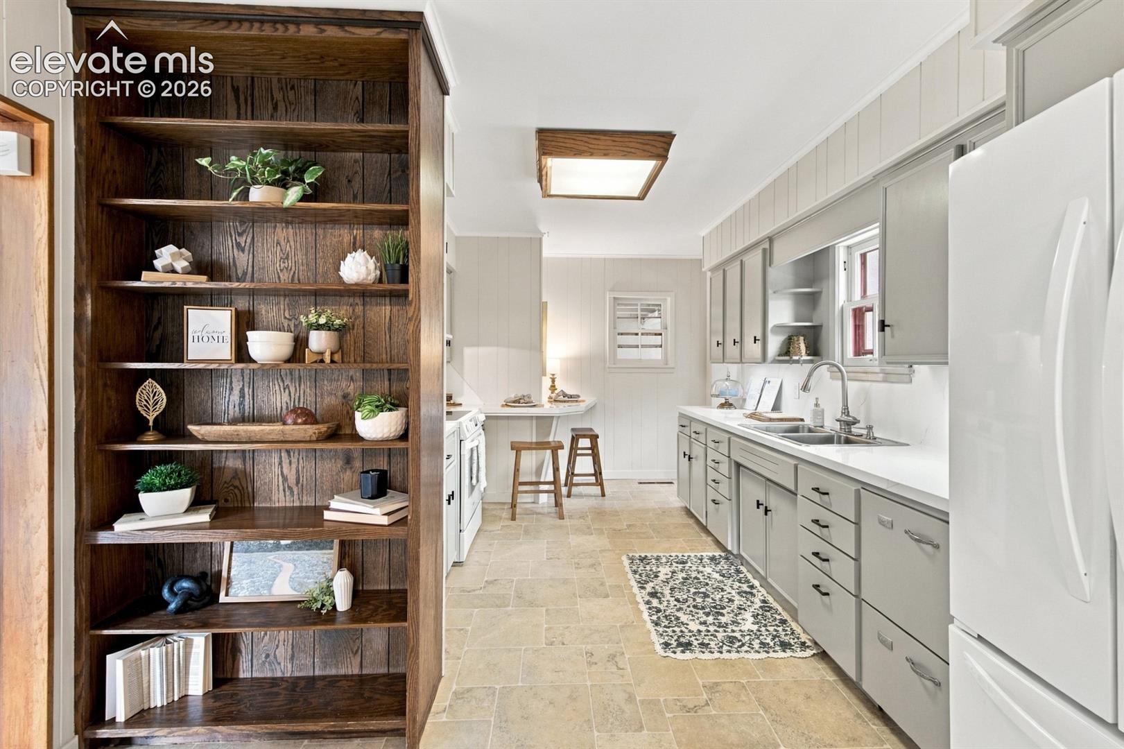 Extra shelving between kitchen and dining