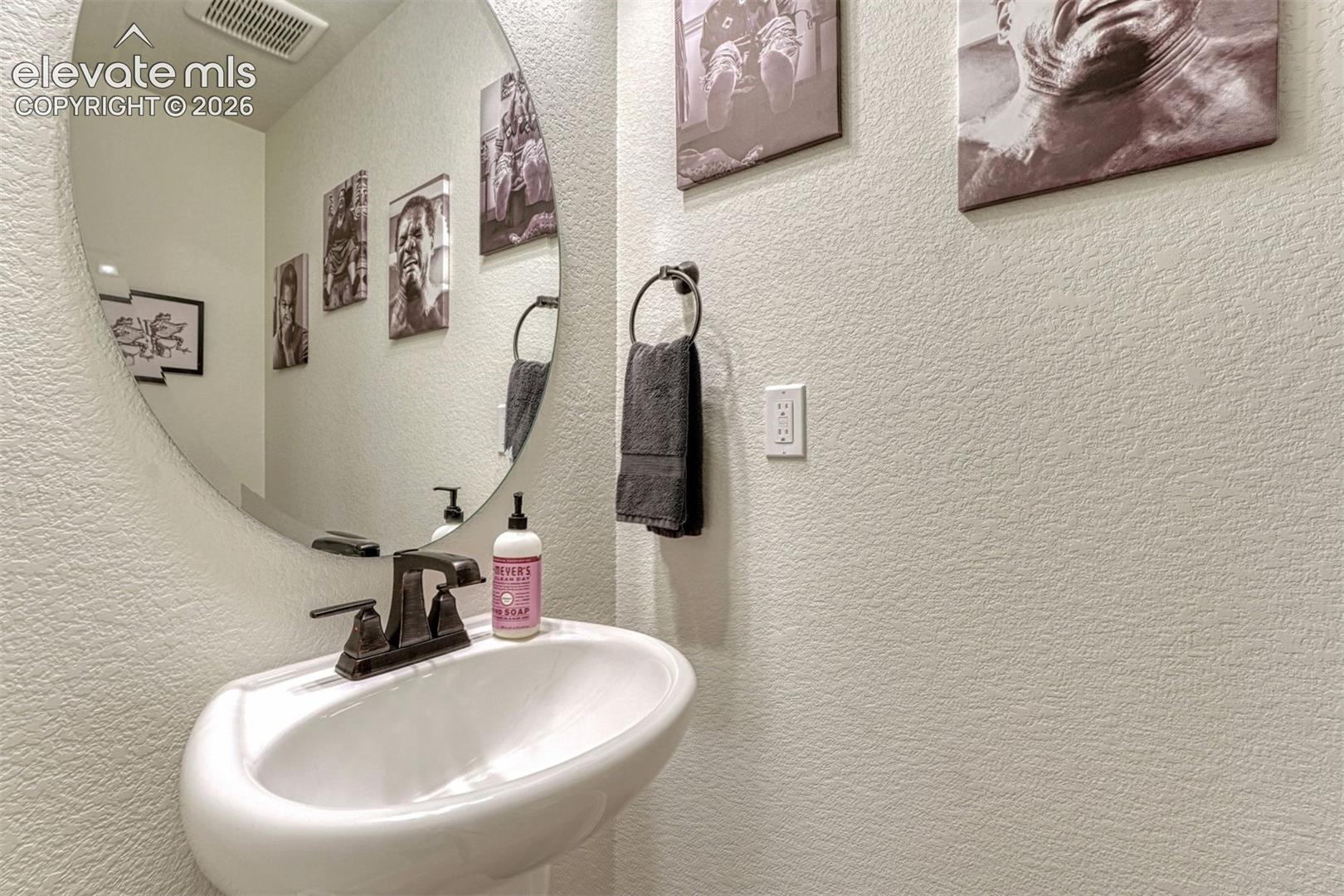 Half bath across from the office