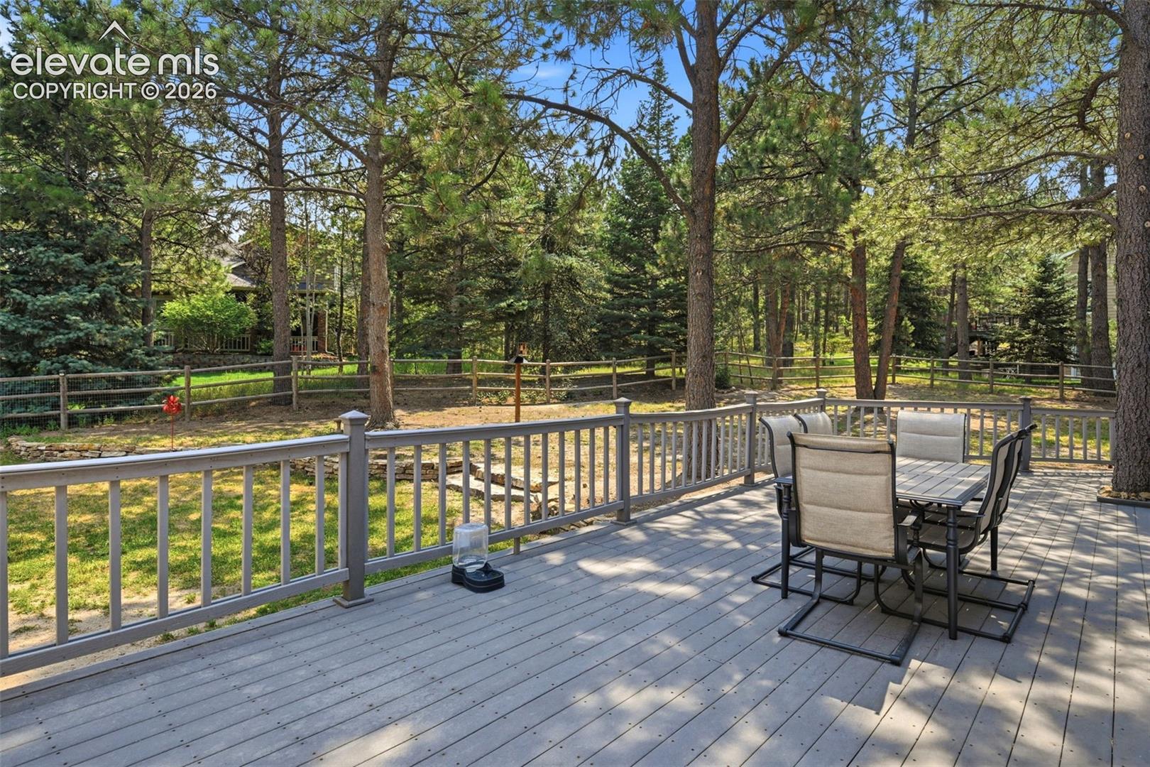 Beautifully treed back yard and composite deck. Completely fenced and room to run.